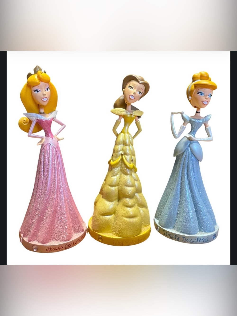 Disney parks Princess bobblehead figurines Aurora, Belle, and Cinderella
